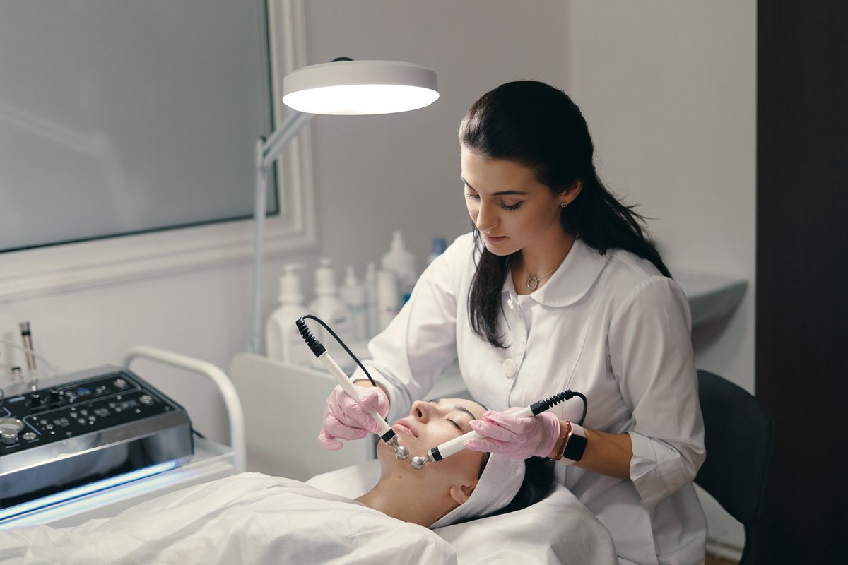 Aesthetic practitioner performing a skin treatment
